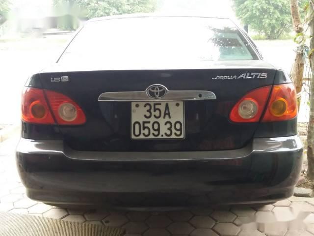 Bán Toyota Corolla Altis đời 2004, màu đen xe gia đình