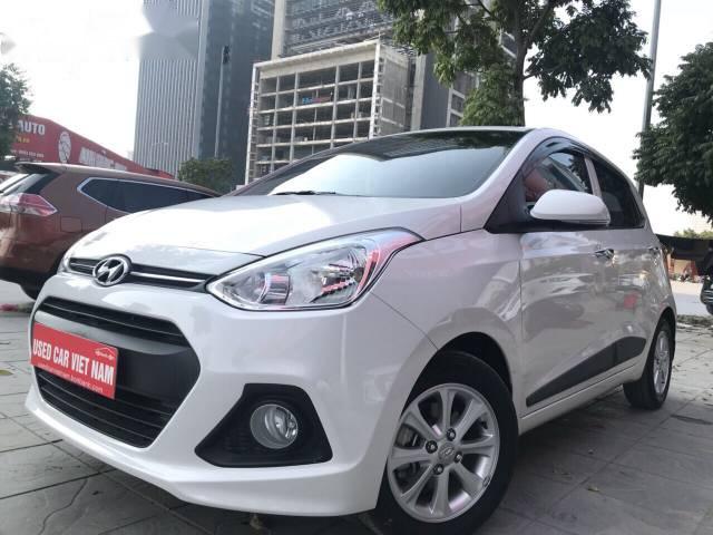 Bán ô tô Hyundai Grand i10 1.25 MT đời 2016, màu trắng, nhập khẩu  