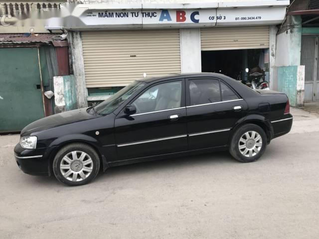 Bán Ford Laser đời 2004, màu đen số tự động