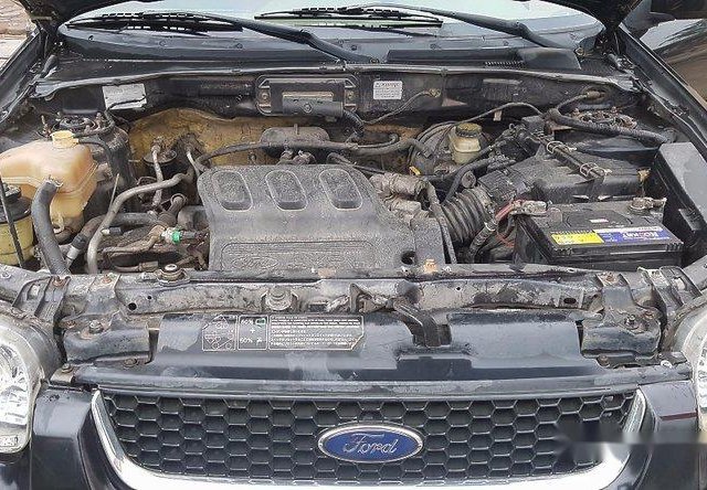 Bán lại xe Ford Escape AT XLT năm 2004, màu đen