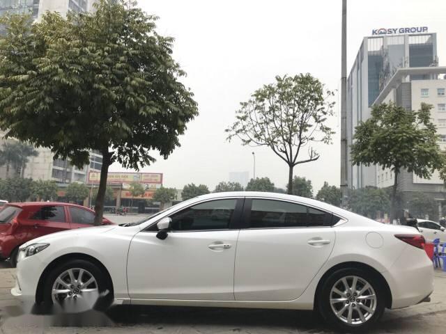 Cần bán Mazda 6 2.0 AT đời 2015, màu trắng, giá tốt