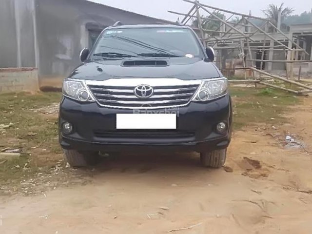 Cần bán Toyota Fortuner 2.5G đời 2014, màu đen số sàn