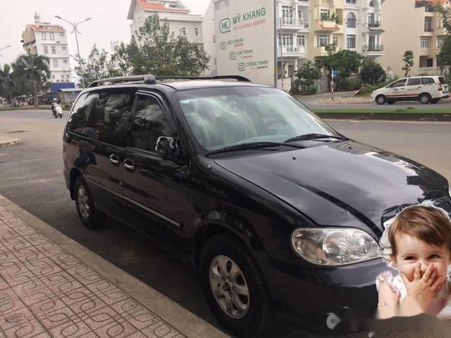 Bán xe Kia Carnival đời 2009, màu đen chính chủ, giá tốt