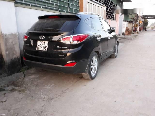 Bán Hyundai Tucson đời 2011, màu đen  