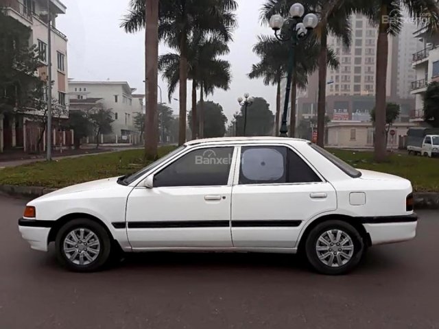 Bán Mazda 323 đời 1996, màu trắng giá cạnh tranh