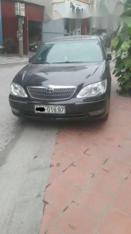 Cần bán gấp Toyota Camry năm 2004, màu đen xe gia đình