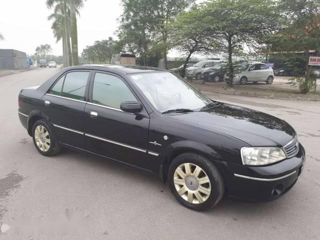 Bán Ford Laser đời 2004, màu đen, 228 triệu