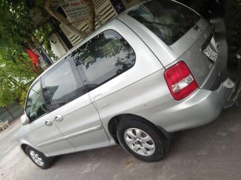 Bán xe Kia Carnival đời 2006, màu bạc