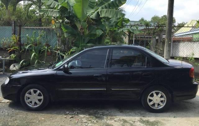 Bán xe Kia Spectra đời 2004, màu đen chính chủ giá cạnh tranh