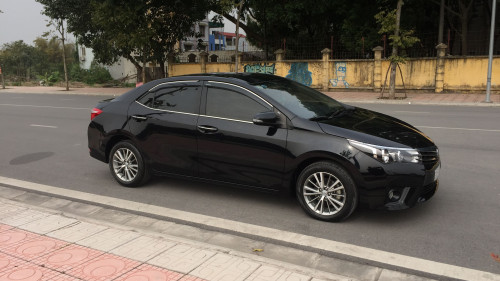 Xe Toyota Corolla altis 1.8 AT đời 2016, màu đen, 719tr