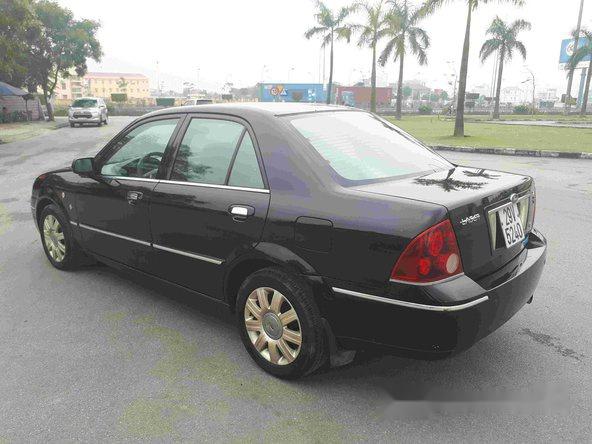 Bán xe Ford Laser 2004, màu đen 