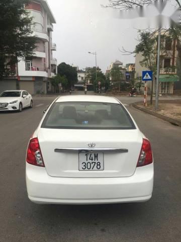 Cần bán xe Daewoo Lacetti đời 2004, màu trắng chính chủ, giá tốt