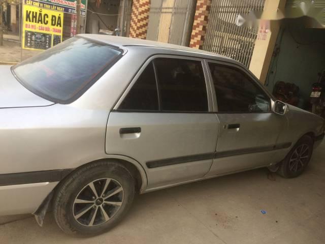 Cần bán Mazda 323 đời 1996, màu bạc, giá tốt