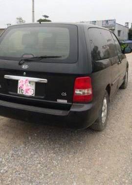 Bán xe Kia Carnival đời 2009, màu đen  