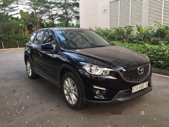 Cần bán lại xe Mazda CX 5 đời 2014, màu đen như mới