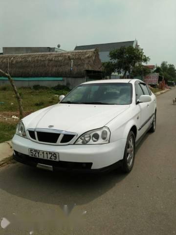 Cần bán gấp Daewoo Magnus 2.0MT 2004, màu trắng, giá chỉ 165 triệu