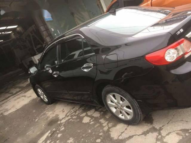 Bán xe Toyota Corolla altis sản xuất 2012, màu đen, giá chỉ 580 triệu