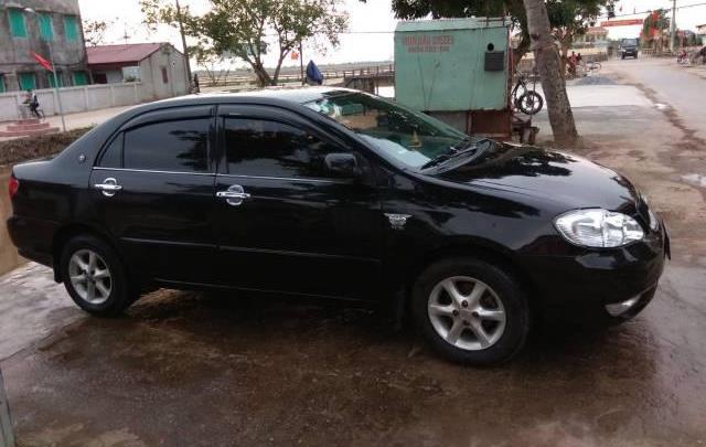 Bán xe Toyota Corolla altis đời 2003, màu đen