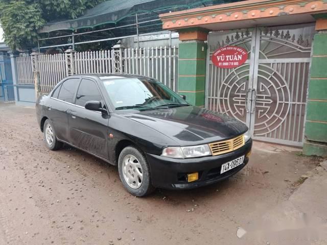 Bán Mitsubishi Lancer sản xuất 2001, màu đen số sàn