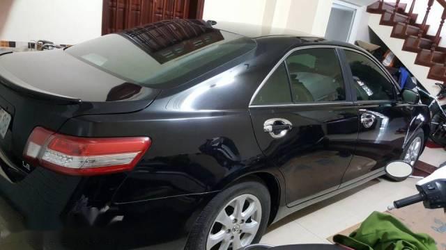 Chính chủ bán gấp Toyota Camry LE năm 2010, màu đen, xe nhập