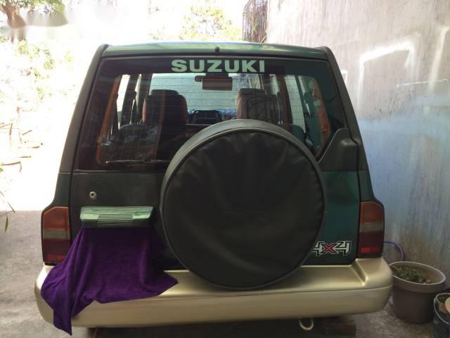 Gia đình bán Suzuki Vitara năm 2005, màu xanh dưa