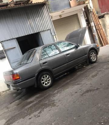 Bán Mazda 323 đời 1995, màu xám