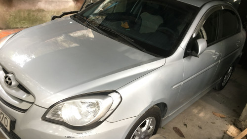 Cần bán lại xe Hyundai Accent 1.4 AT sản xuất năm 2010, màu bạc chính chủ, 295tr