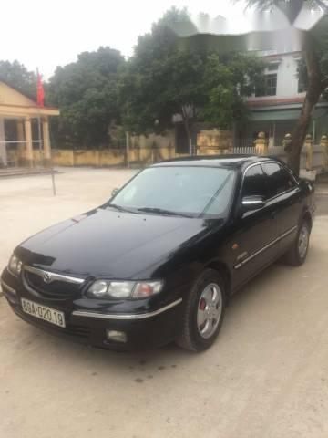 Cần bán gấp Mazda 626 sản xuất năm 1999, màu đen, 130tr