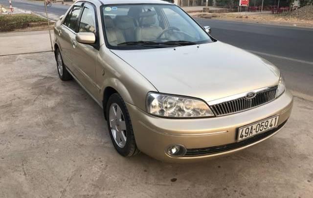 Bán Ford Laser đời 2003, màu vàng cát