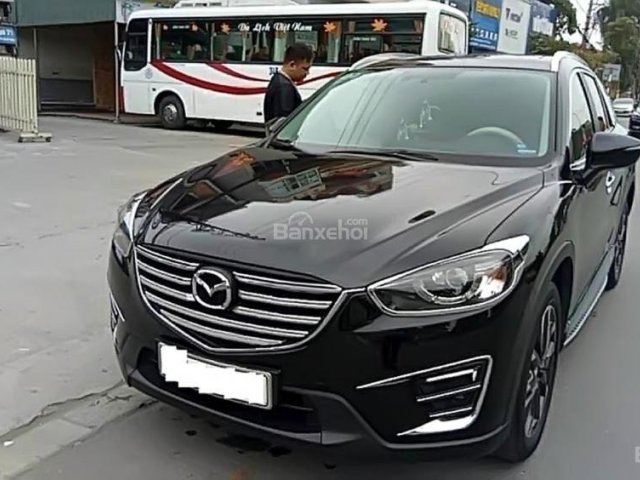 Cần bán gấp Mazda CX 5 2.5 AT 2WD năm sản xuất 2017, màu đen xe gia đình, giá 890tr