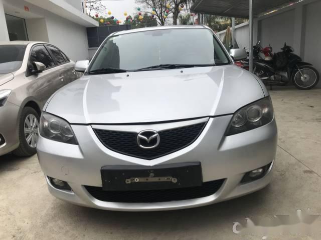 Bán ô tô Mazda 3 năm sản xuất 2004, màu bạc 