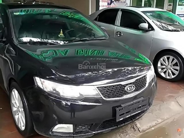 Cần bán Kia Forte SLi 1.6 AT năm 2010, màu đen, xe nhập chính chủ