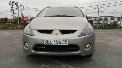 Bán xe Mitsubishi Grandis 2.4 AT đời 2009, màu vàng  