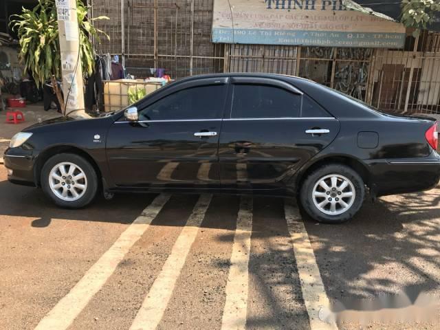 Cần bán lại xe Toyota Camry đời 2003, màu đen