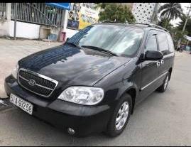 Bán xe Kia Carnival đời 2009, màu đen, giá chỉ 285 triệu