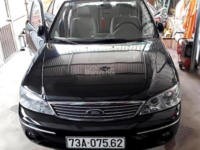 Bán xe Ford Laser GHIA 1.8 AT đời 2005, màu đen 