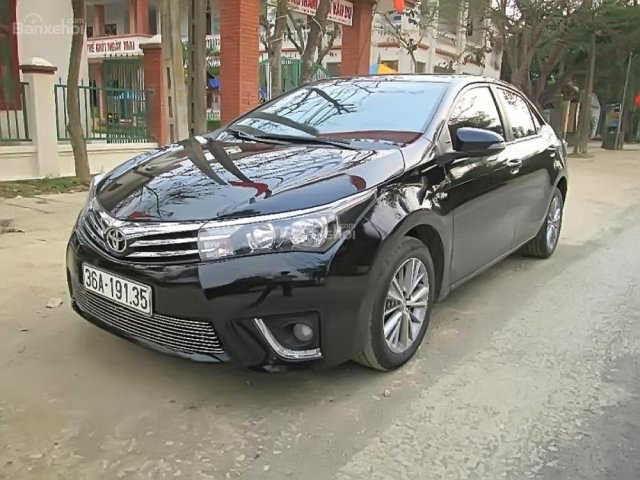 Bán Toyota Corolla Altis 1.8AT đời 2016, màu đen xe gia đình, giá 680tr