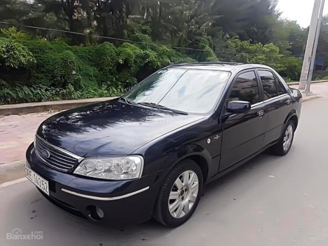 Bán Ford Laser GHIA 1.8 AT sản xuất năm 2004, màu đen  