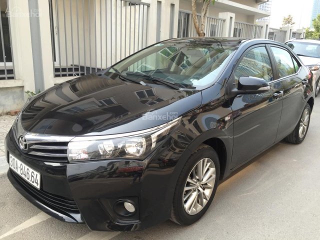 Cần bán xe Toyota Corolla altis 1.8G đời 2015, màu đen