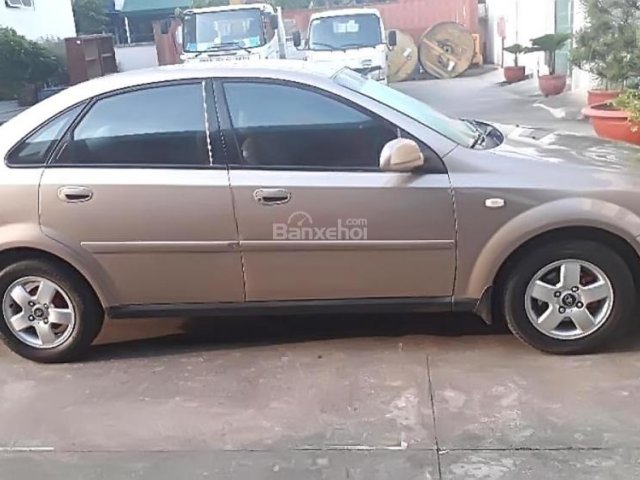 Chính chủ bán xe Daewoo Lacetti EX 1.6 MT đời 2004, màu vàng cát