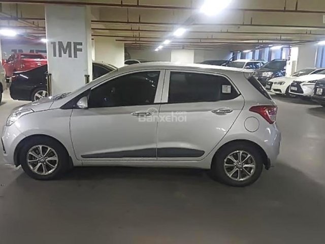 Cần bán xe Hyundai Grand i10 1.2 AT sản xuất 2014, màu bạc, nhập khẩu