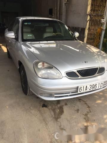 Cần bán gấp Daewoo Nubira MT sản xuất năm 2004, màu bạc