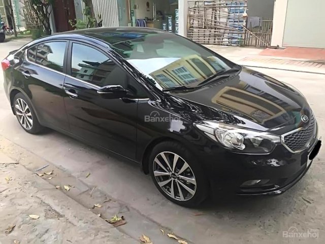 Bán Kia K3 2.0 AT 2015, màu đen chính chủ, 580tr