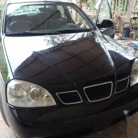 Cần bán xe Daewoo Lacetti đời 2004, màu đen