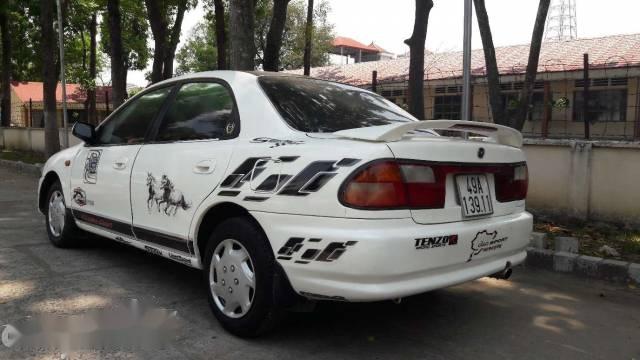 Bán Mazda 323 1.6 MT đời 1999, màu trắng, nhập khẩu