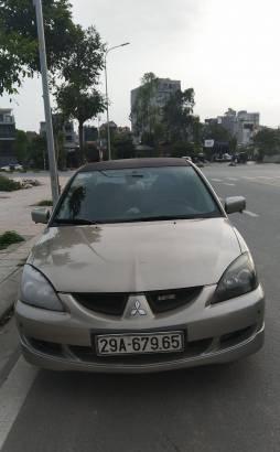 Chính chủ bán Mitsubishi Lancer 2.0 AT đời 2005, màu vàng