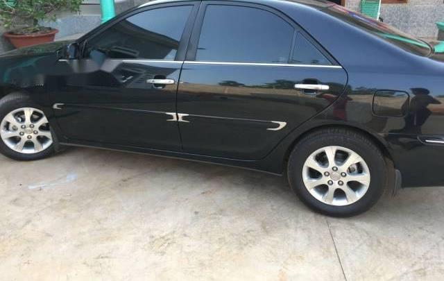 Cần bán lại xe Toyota Camry 2.4 đời 2004, màu đen