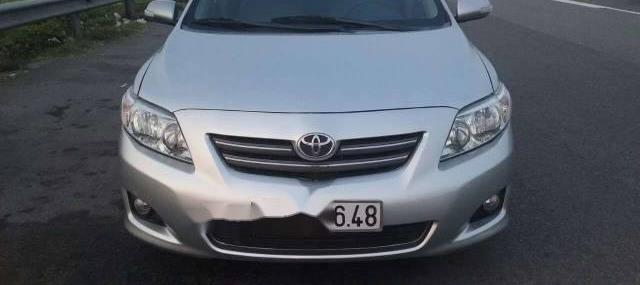 Bán Toyota Corolla altis 1.8 G đời 2009, màu bạc 