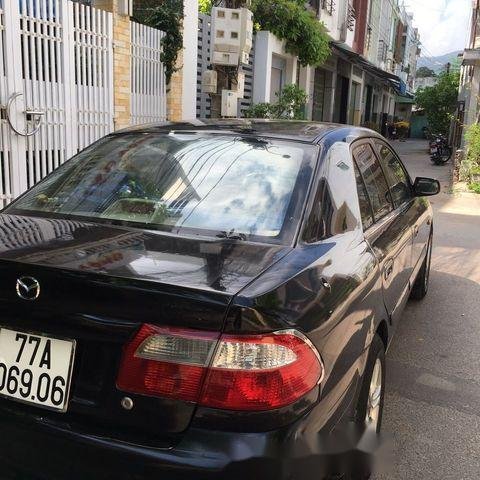 Bán ô tô Mazda 626 năm sản xuất 2001, màu đen  