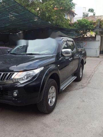 Bán ô tô Mitsubishi Triton đời 2015, màu đen chính chủ, giá chỉ 450 triệu